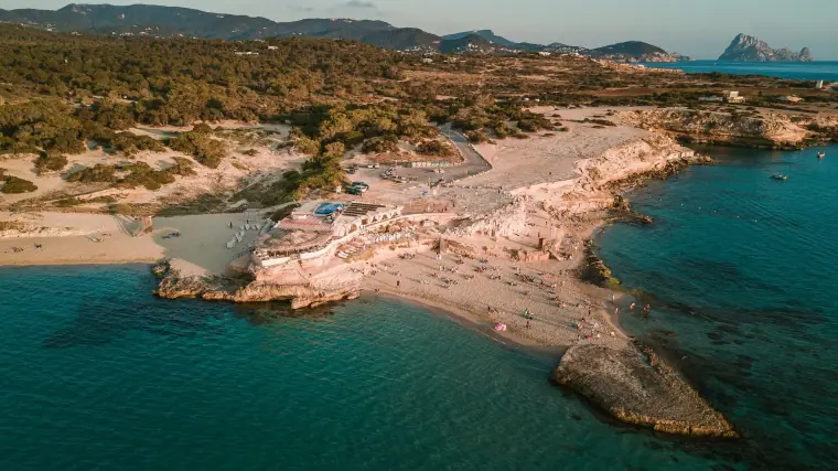 Aerial view of Cala Conta beach and its turquoise shallows, Ibiza