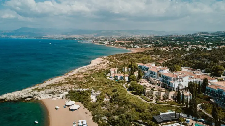 Aerial view of Anassa Hotel and the turquoise coastline near Latchi, Paphos