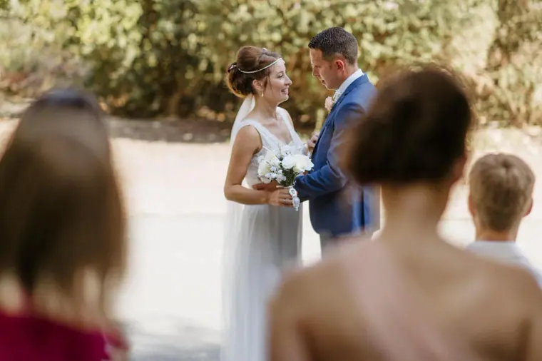 Bride and groom exchanging rings during the ceremony