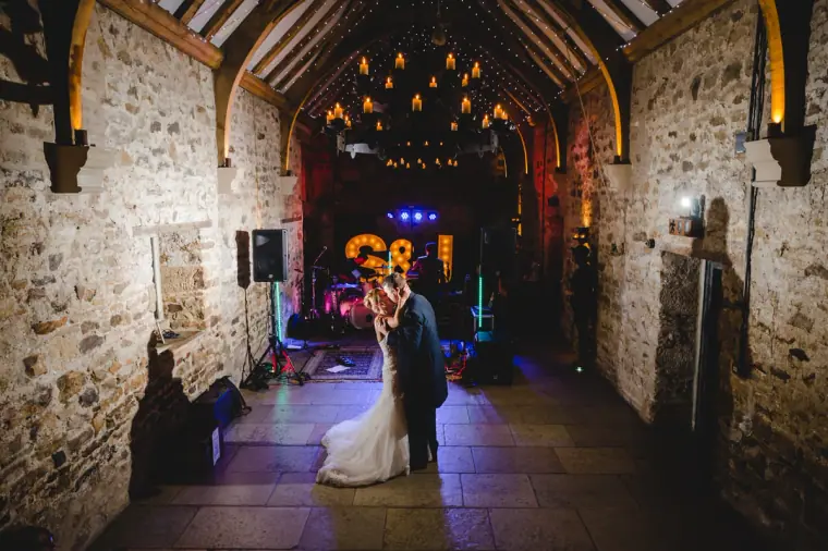 Sonny and Jo sharing their first dance in the long stone hall