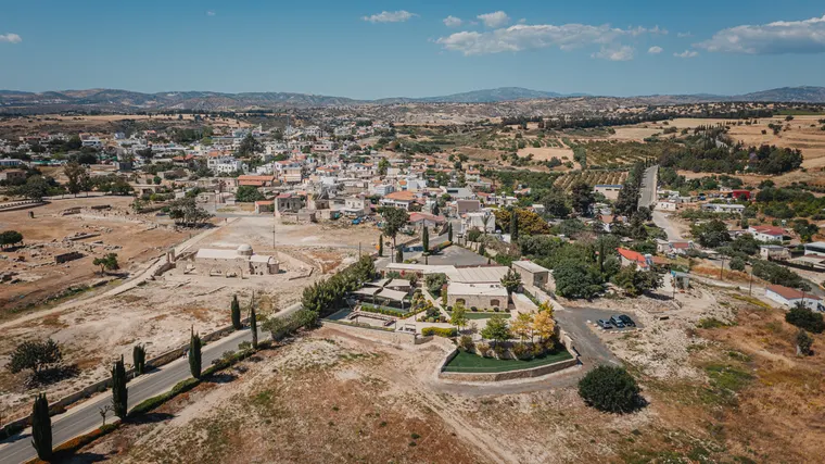 Aerial view over Liopetro and the village of Kouklia with farmland stretching to the hills