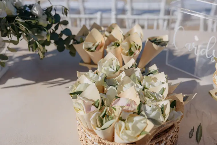 Basket of paper cones filled with petals for the confetti exit