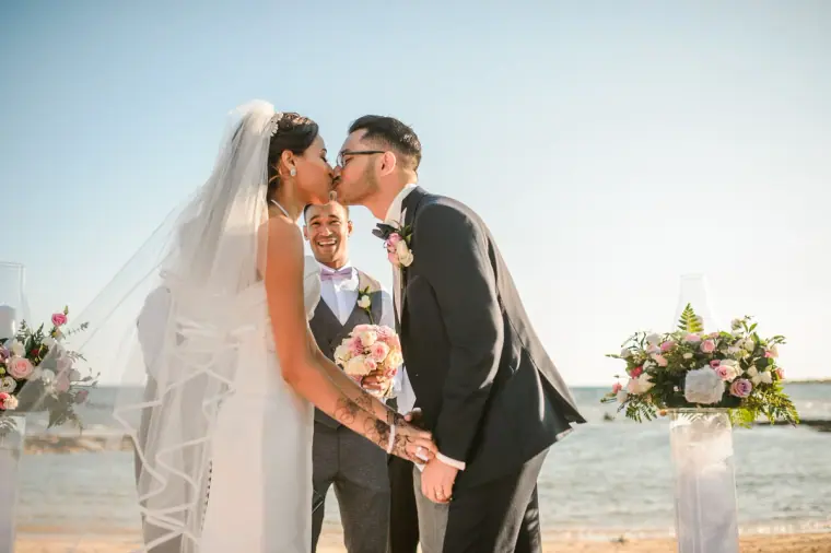 Raya and Adhib sharing their first kiss as husband and wife on the beach
