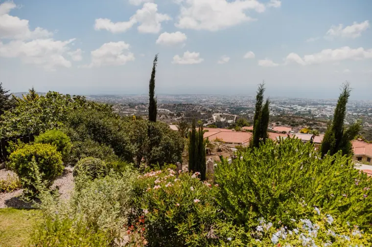 Cypress trees and gardens looking down towards Paphos from the hills at Tsada