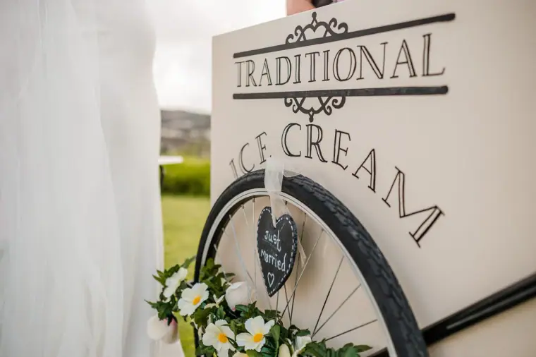 Vintage "Traditional Ice Cream" sign on a bicycle cart with a chalk heart