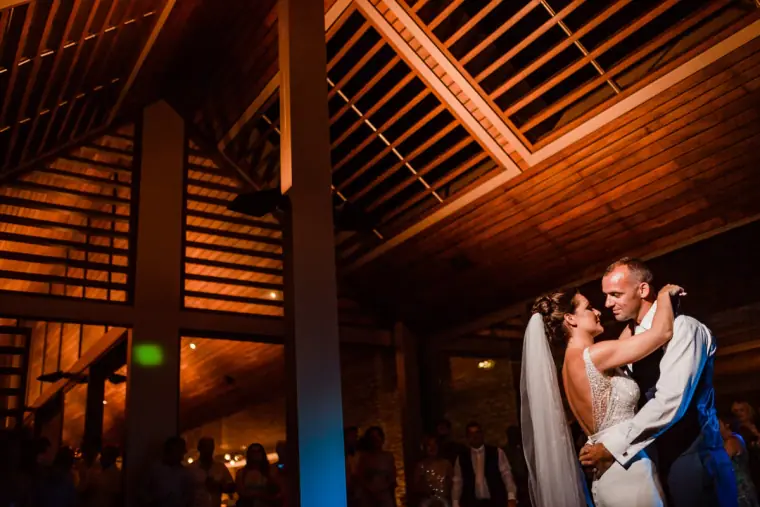 Kaye and Matt's first dance beneath the timber-beamed ceiling at Minthis Hills