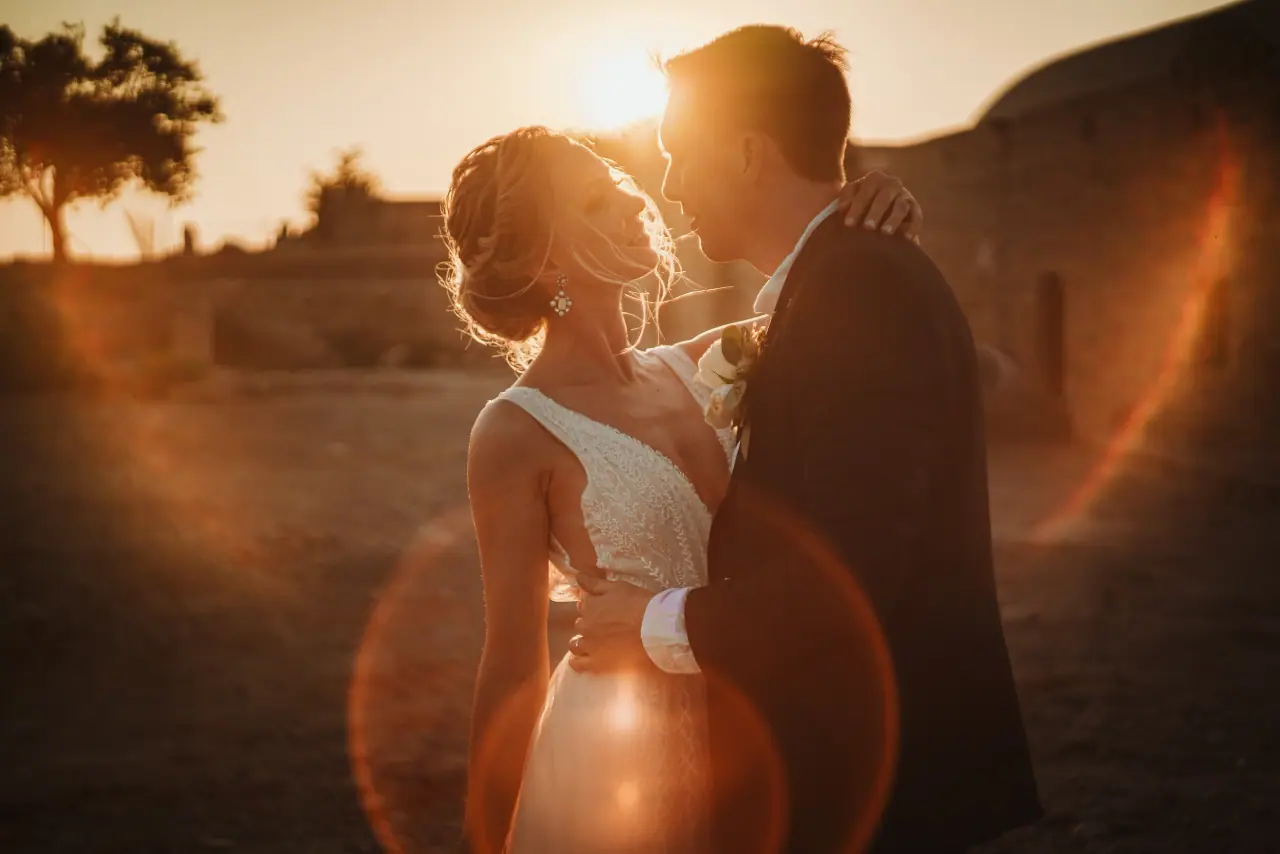 Kristina and Jamie face to face with a warm sun flare at Liopetro