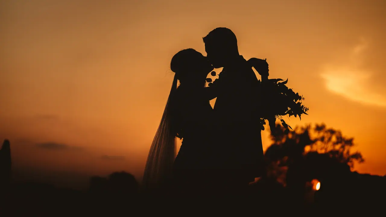 Jemma and Andrew silhouetted against a Cyprus sunset at Liopetro, Kouklia