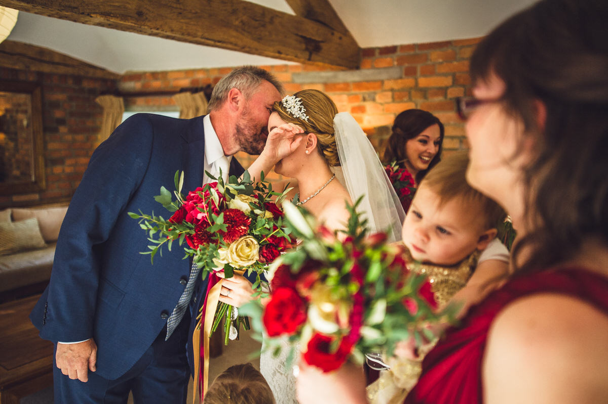 a very emotional bride and her father