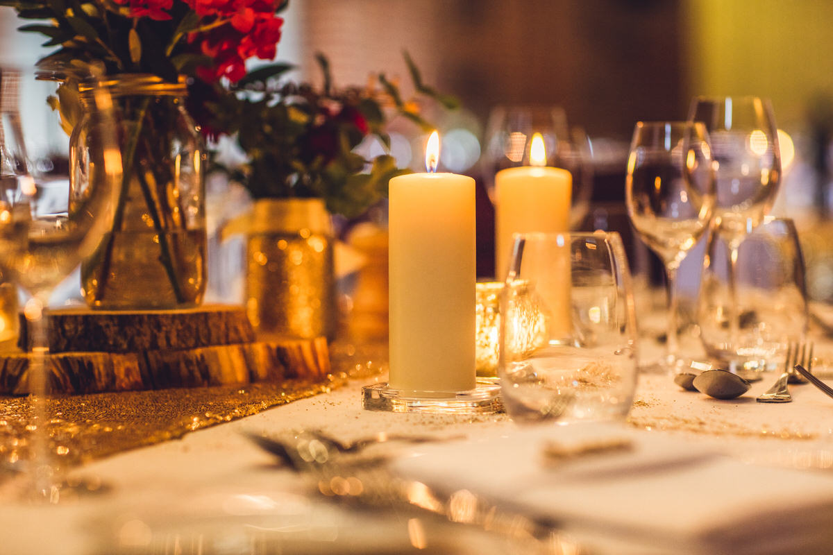 glasses and candles glowing