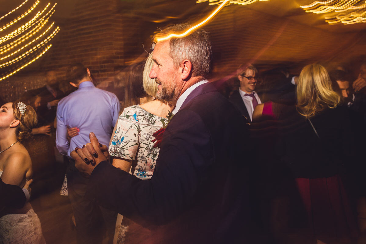 partners dancing at venue