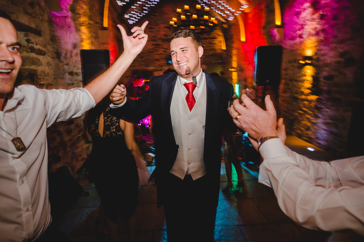 Happy groom dancing party